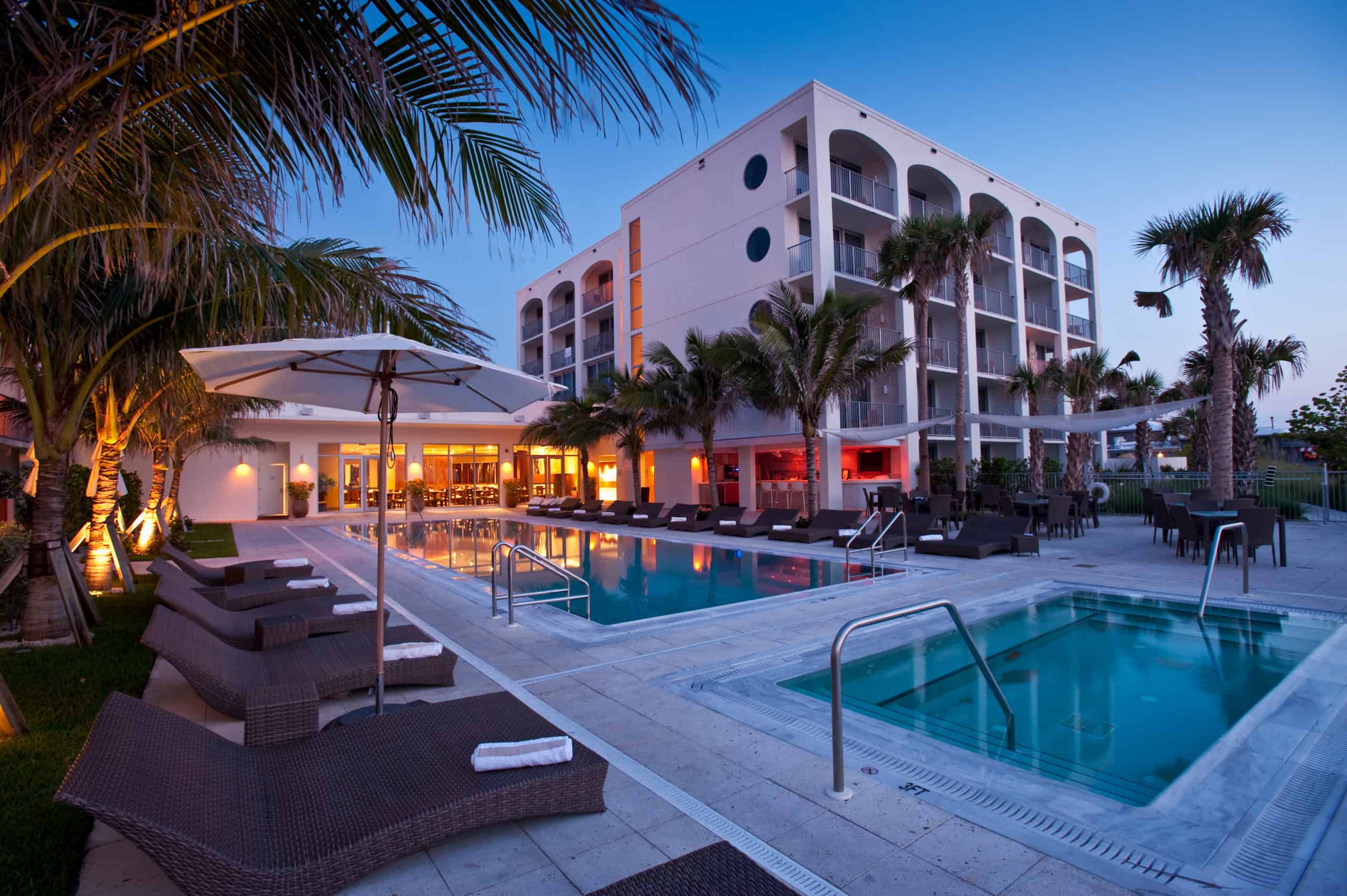 Hotel Patio with pools and palm trees