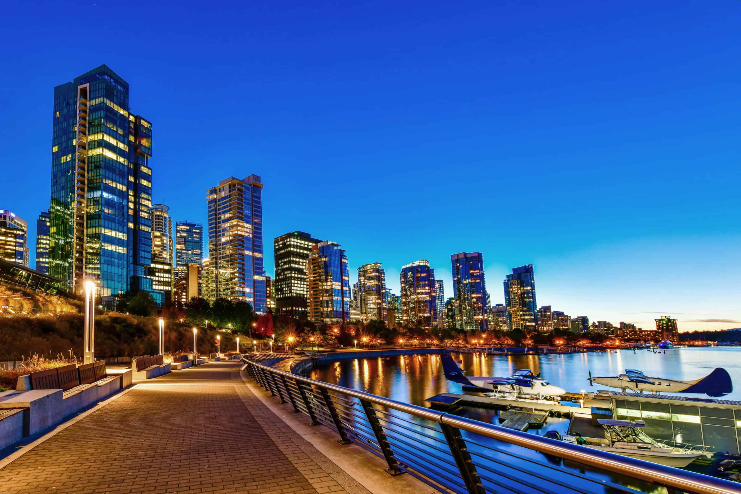 Picture outdoor walkway next to skyline during sunset