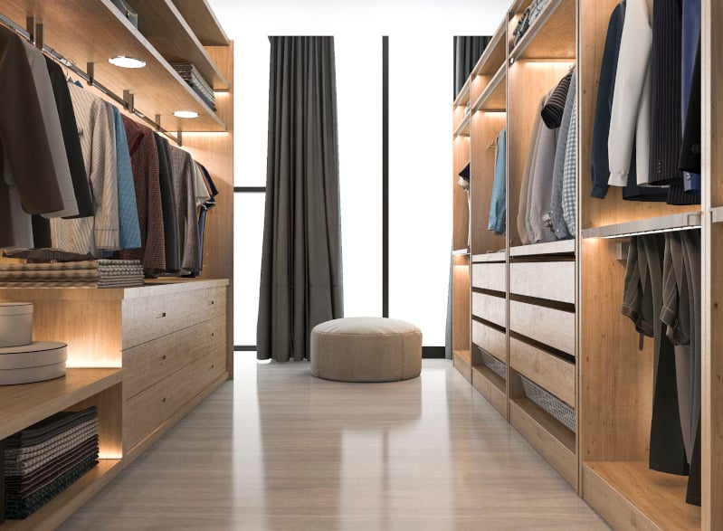 walk-in closet with drawers and shelf