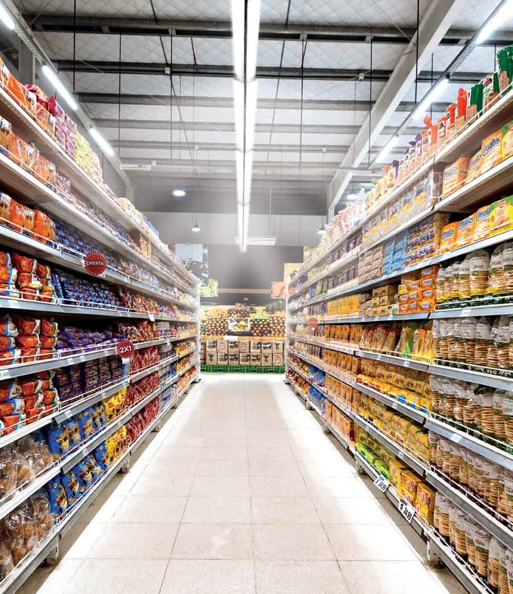 Aisles and shelves in supermarket, wide angle view